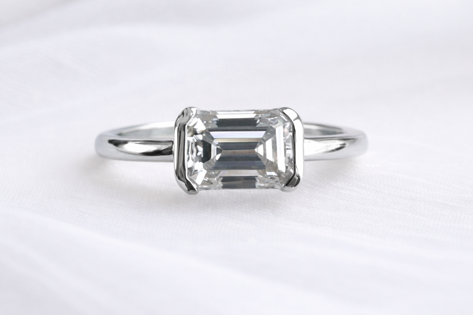 Signature Rio East West Half Bezel Emerald Cut 1.5ct Ring image 3